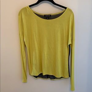 Green lightweight top with black mesh back